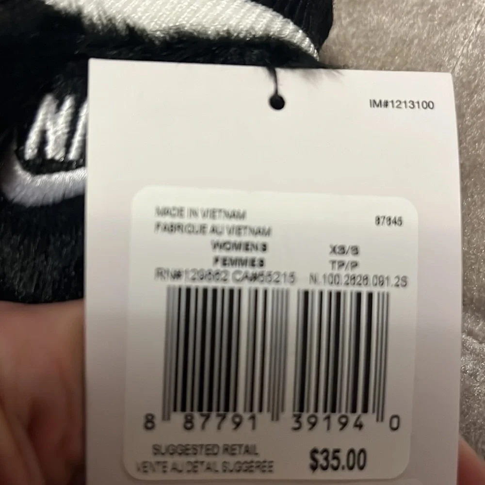 Nike women’s mittens with faux fur on the outside and soft fleece on the inside